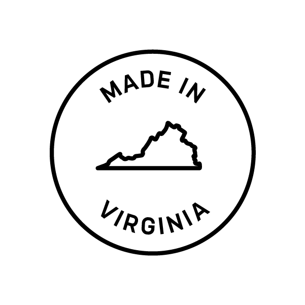 A circular logo with the words "Made In Virginia" written around the outer edge. Inside the circle, there is an icon of a the state of Virginia. The logo is black on a white background.
