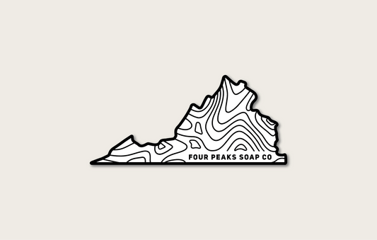 A sticker for Four Peaks Soap Co. that features an illustration of the state of Virginia with topographic map graphics. Text at the bottom says "Four Peaks Soap Co." The logo has a white and black color scheme.